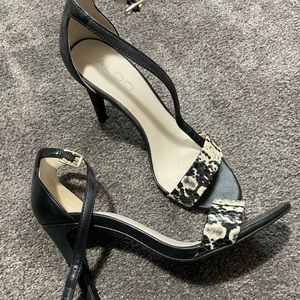 Pair of Aldo black and white sandals